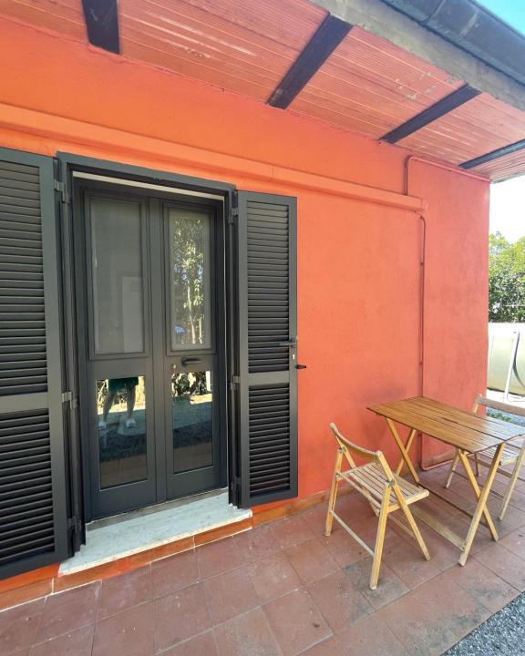 Orbetello House | Camera graziosa