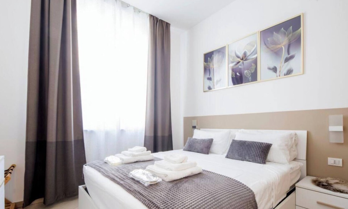 San Teodoro Apartment | Ferry port 1 min| Central 1BR| A/C| WiFi| By Tilo