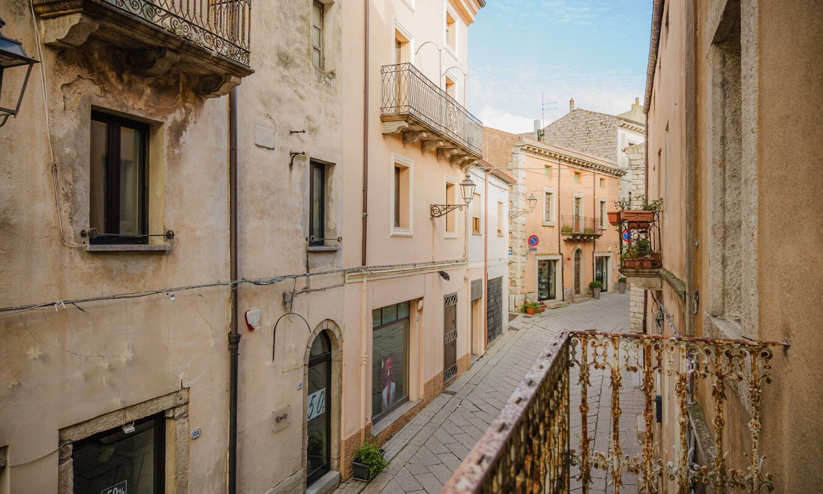 Calangianus Apartment | Quadruple Room with Balcony Overlooking the Main Street and Square, Air Conditioning