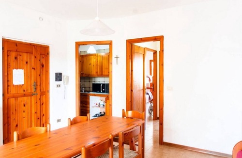 Lido Apartment | A comfortable 65 square meters apartment, perfect for six people, located on the first floor of a building without an elevator within a residential complex.The property is located in Alghero and enjoys an excellent location, close to the sea and several