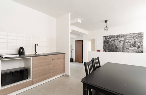 Giambellino Apartment | A cozy 60 sqm apartment that sleeps up to 4 people, located on the semi-basement level of a building (accessible via stairs).The neighborhood is well-connected to the city center and major attractions by public transport; the Tolstoj stop on the M4 met