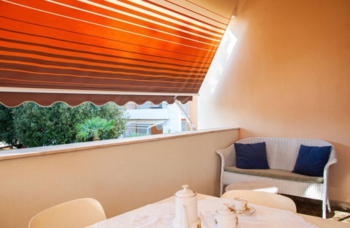 Lido Apartment | A cozy and comfortable 65 square meters apartment, perfect for five people, located on the first floor of a building without an elevator.The property enjoys an excellent location in Alghero, located on the street parallel to the seafront: you can reach A