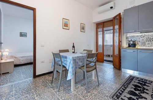 Sant'Antioco Apartment | A cozy and spacious 80 square meters apartment, perfect for four people, located on the first floor of a typical Sant'Antioco building (NO elevator).The property is located a short distance from the town center and offers quick access to the seafront. It