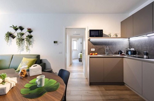Torbole sul Garda Apartment | Apartment 'Boutique Tiffany' with Balcony, Wi-Fi and Air Conditioning