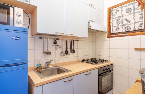Li Cuncheddi Apartment | Apartment 'Casa Vacanze Ribes' with Sea View, Shared Pool and Private Terrace