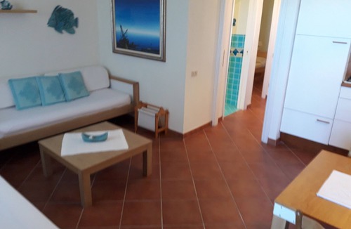Golfo di Marinella Apartment | BEACH AT 200 METERS AND 50 METERS SWIMMING POOL, AIR CONDITIONING, PARKING PLACE