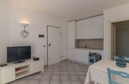 Baia Caddinas Apartment | Beautiful apartment for 4 people with pool, WIFI, A/C, TV, terrace and pets allowed