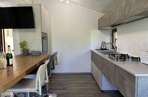 Cologna Spiaggia Villa | Beautiful apartment in villa with hot tub, WIFI, A/C, pool, TV, patio, pets allowed, panoramic view