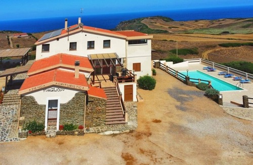 Sassari House | Camera quadrupla vista mare con bagno e cucina