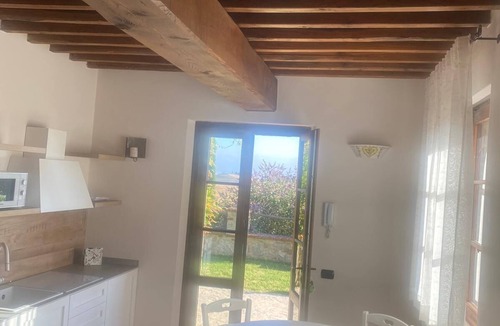 Bollano Apartment | Comfortable Flat in Asciano, air conditioning, garden with gazebo, pool, G