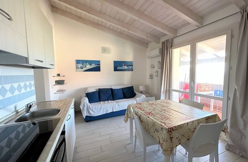 Badesi Apartment | Complete two-room penthouse apartment with fabulous sea view, shared pool and parking space