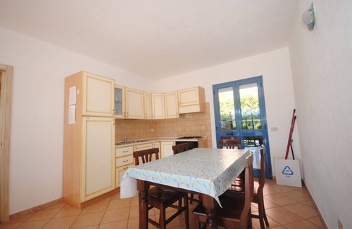Monte Petrosu Apartment | COZY COTTAGE WITH GARDEN AND POOL 900 METERS FROM THE BEACH