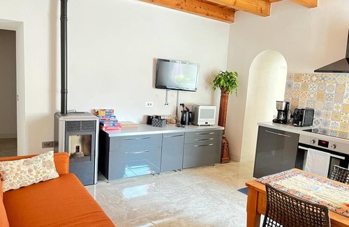 Naggio Apartment | 'Crooked House' Apartment with Mountain View, Private Garden and Parking