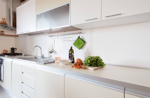 Monte Petrosu Apartment | Granito's Apartment with Partial Sea View, Outdoor Space, and Air Conditioning