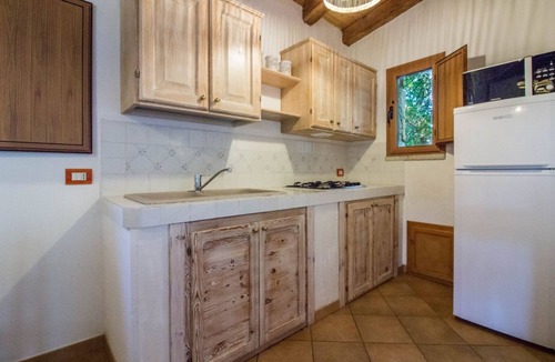 Arzachena Villa | GuestHost - A welcoming and charming 71 square meters villa, perfect for four people, with a private entrance (two steps to access).The property is located in an extremely quiet location and is surrounded by the lush Sardinian nature: from the veranda yo