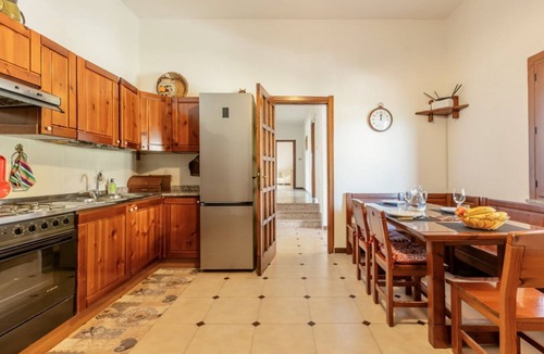 Nuraxi Figus Villa | GuestHost - A welcoming and spacious 100-square-meter villa, perfect for seven people, featuring a private entrance and private outdoor parking for two vehicles.The property is located in Nuraxi Figus, a quiet hamlet of Gonnesa: from here, guests can vis