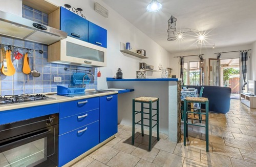 Torre delle Stelle Apartment | GuestHost - Cozy 70 sqm apartment with private parking space; accommodates up to 4 people plus camping cot on request.The courtyard is covered and privateWe are located in a renowned tourist resort on the Gulf of Cagliari.The accommodation consists of tw