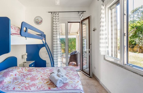 Torre delle Stelle Apartment | GuestHost - Cozy 70 sqm apartment with private parking space; accommodates up to 4 people plus camping cot on request.The courtyard is covered and privateWe are located in a renowned tourist resort on the Gulf of Cagliari.The accommodation consists of tw