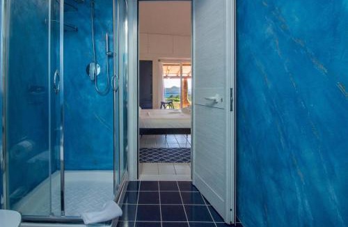 Cala di Volpe Apartment | GuestHost - Villa With Private Garden, Parking & Shared Pool!