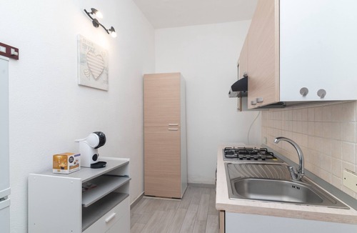 Tiriddo House | Holiday Home 'Casa Vacanze Olbia' with Shared Pool, Balcony and Air Conditioning