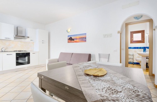 Baia Caddinas House | Holiday Home 'Residence Orizzonti App N 23' with Sea View, Private Terrace and Air Conditioning
