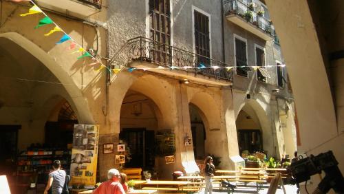 Pieve di Teco Apartment | Medieval Pieve Essenza di Riviera - holiday home with garden, WiFi & parking