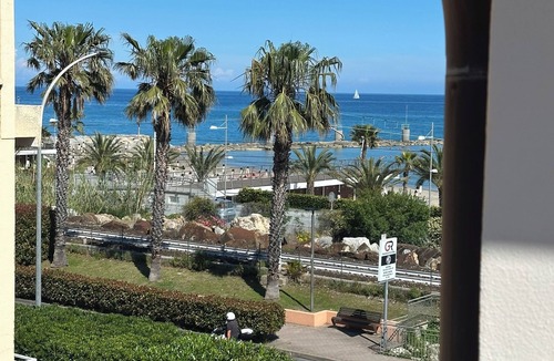 Loano Apartment | Panoramic attic horizon with parking. Very close to the sea and services.