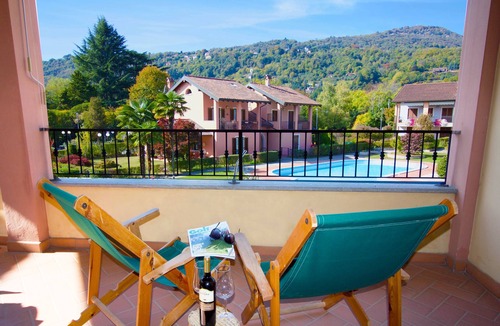 Lesa Apartment | Sunflower - Lake Maggiore Duplex w/Terrace and Shared Pool, Lesa, Italy