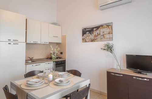 Villasimius Apartment | Two-room apartment with 4 beds, about 45 m2, living room with kitchenette and double sofa bed, bedroom with double bed (separable beds), bathroom with toilet, bidet and shower. Possibility 1 infant in cot. The charming apartments can be arranged on t