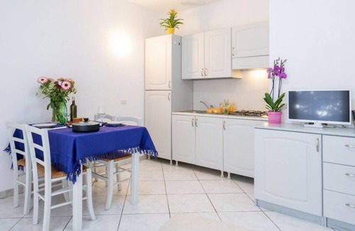 Badesi Apartment | Two-room apartment of approximately 40 m2 composed of a living room with kitchenette, double sofa bed, double bedroom, bathroom, balcony.Some apartments may also have a bunk bed.Endowed of:- TV- Outdoor chairs, table- External Parking space- Kitchenette-