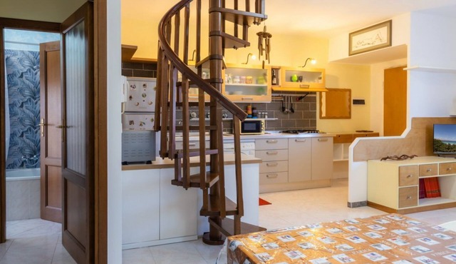 A charming 70 square meters apartment, perfect for six people, located on the first floor of a renovated terraced building (no elevator).The property is located in Olmedo, a small town in northwestern Sardinia, nestled inland between Alghero and Sassari.