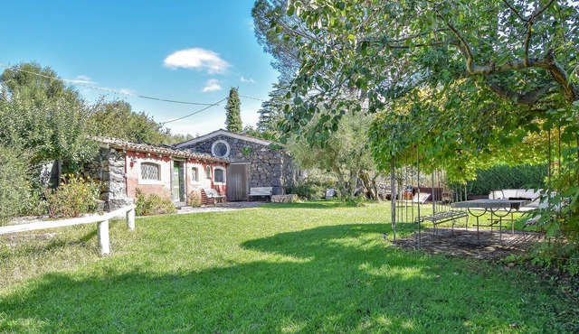 Charming rustic cottage with pool.