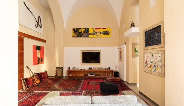 Dramatic Arches, Striking Architectural Apartment in Monti District Colosseum in Roma