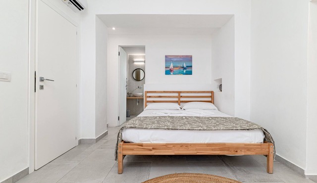 Ghjlgolu House Apartment – Tavolara Room with Wi-Fi and Air Conditioning