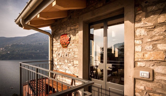 'Loft and Veranda on Lake Como' Apartment with Lake View, Wi-Fi, and Air Conditioning