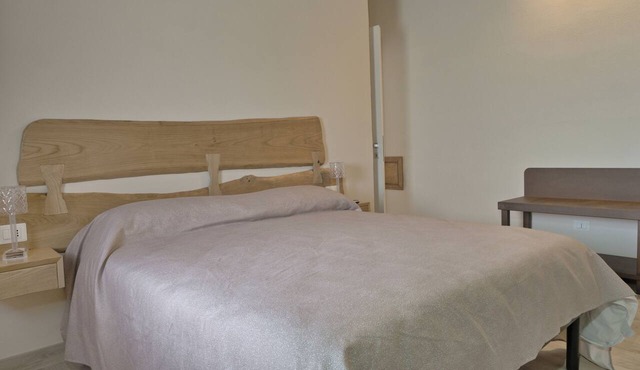 Moderno 60mq: camera soggiorno cucina divanoletto