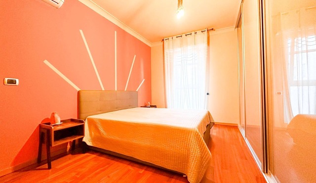 ORANGE ROOM WITH GARDEN VIEW