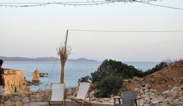 Restored stable overlooking the sea at Cova