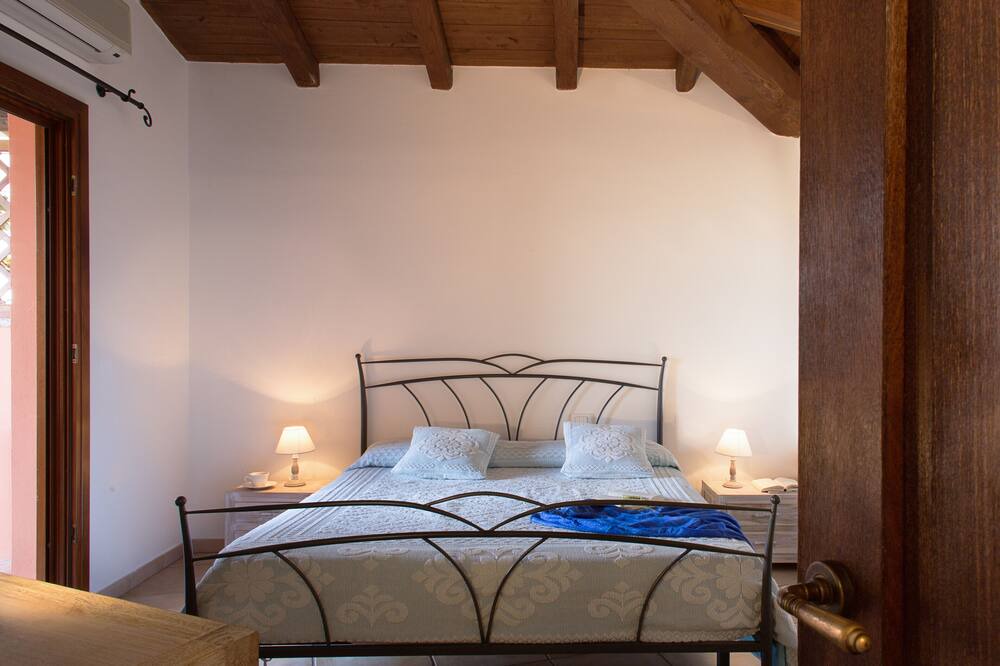 Photo of Bedroom in Capo Coda Cavallo